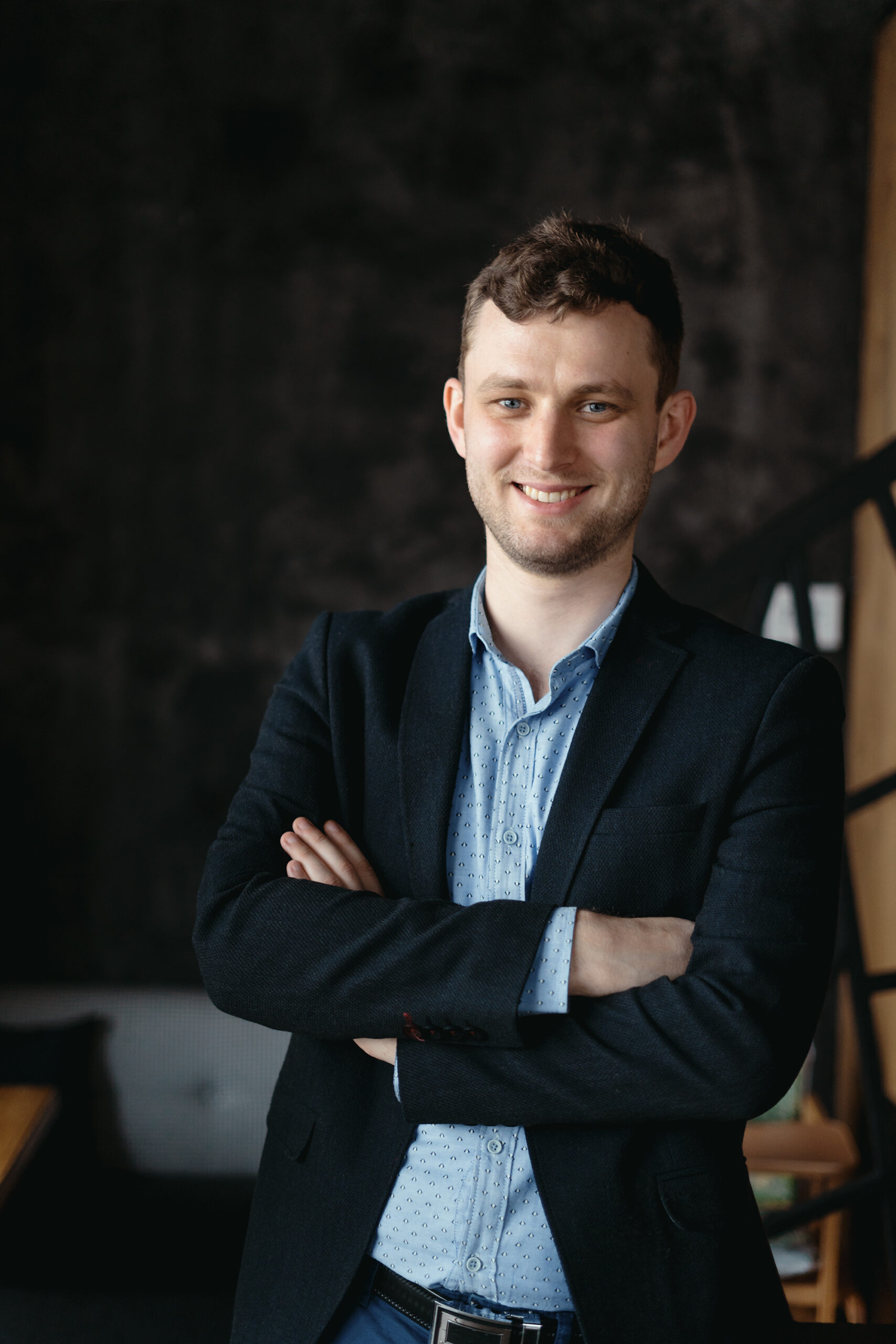 man portrait posing in a loft modern space